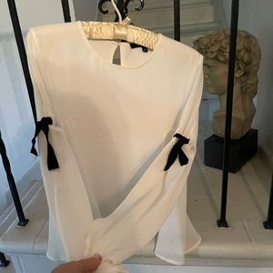 Strut and bolt blouse